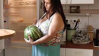 An amazing German woman with dark hair riding a fat cock